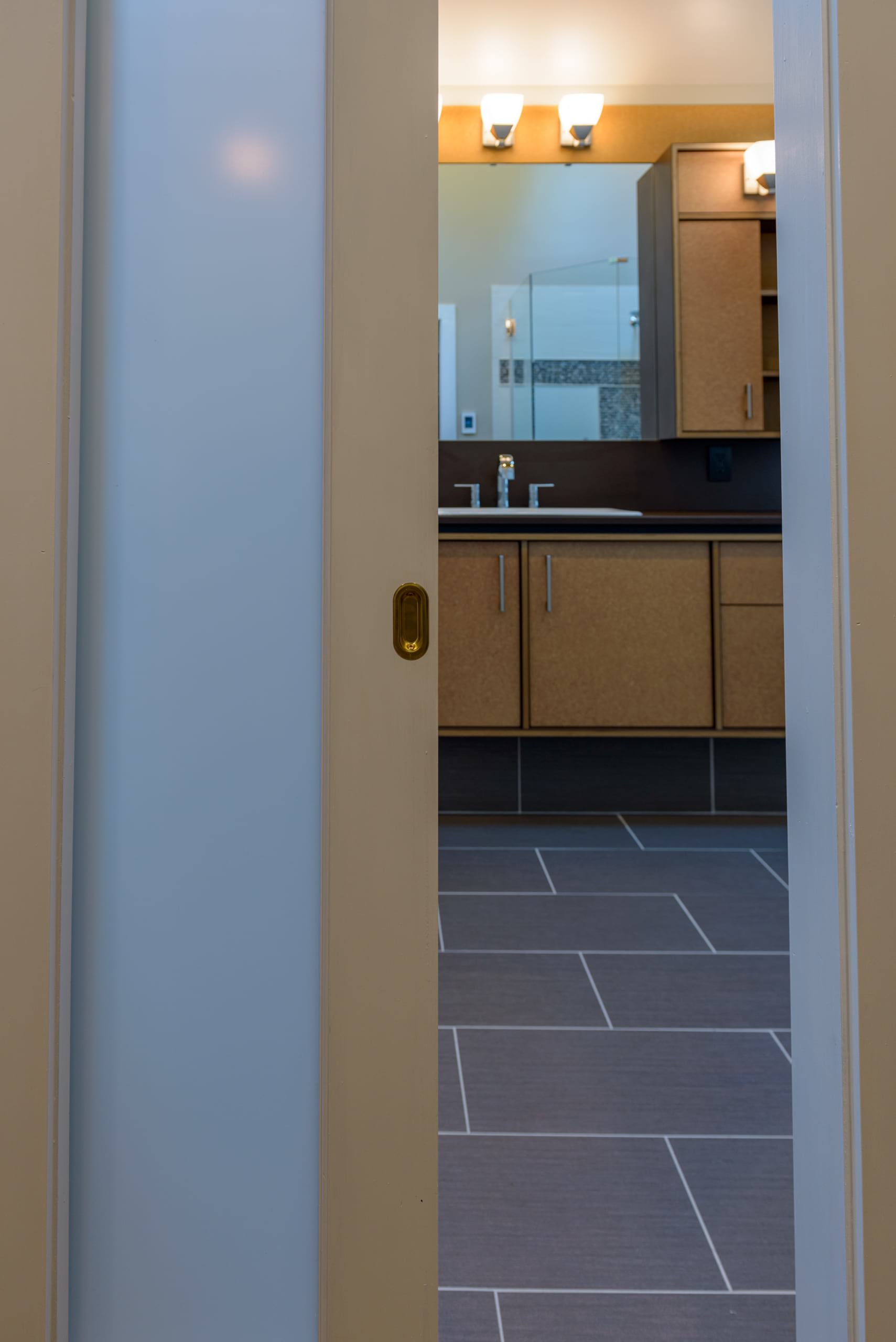 Richlite Baltic Birch Bathroom Vanity & Millwork - Pocket Door