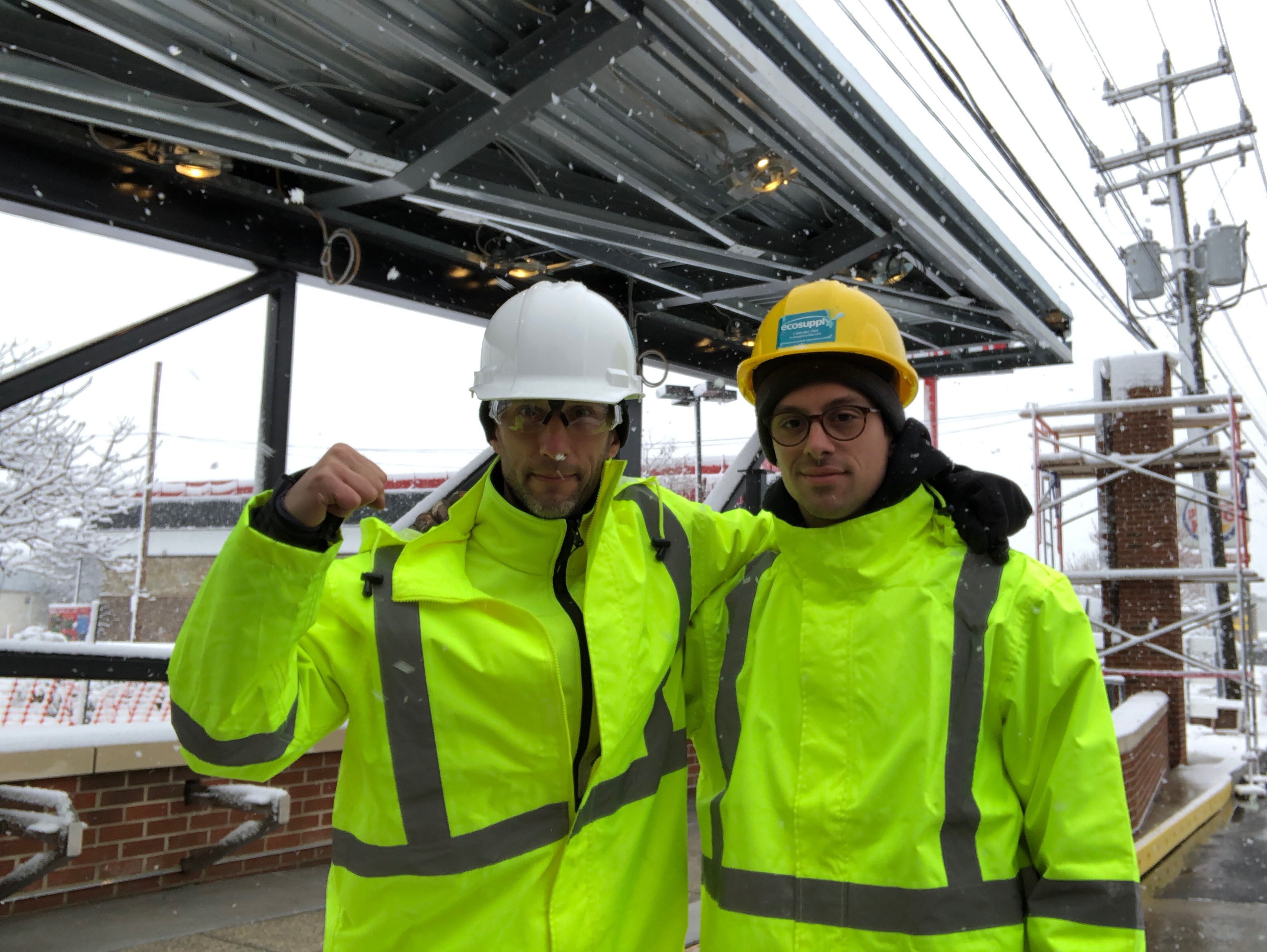EcoCuts team installing benches in the snow