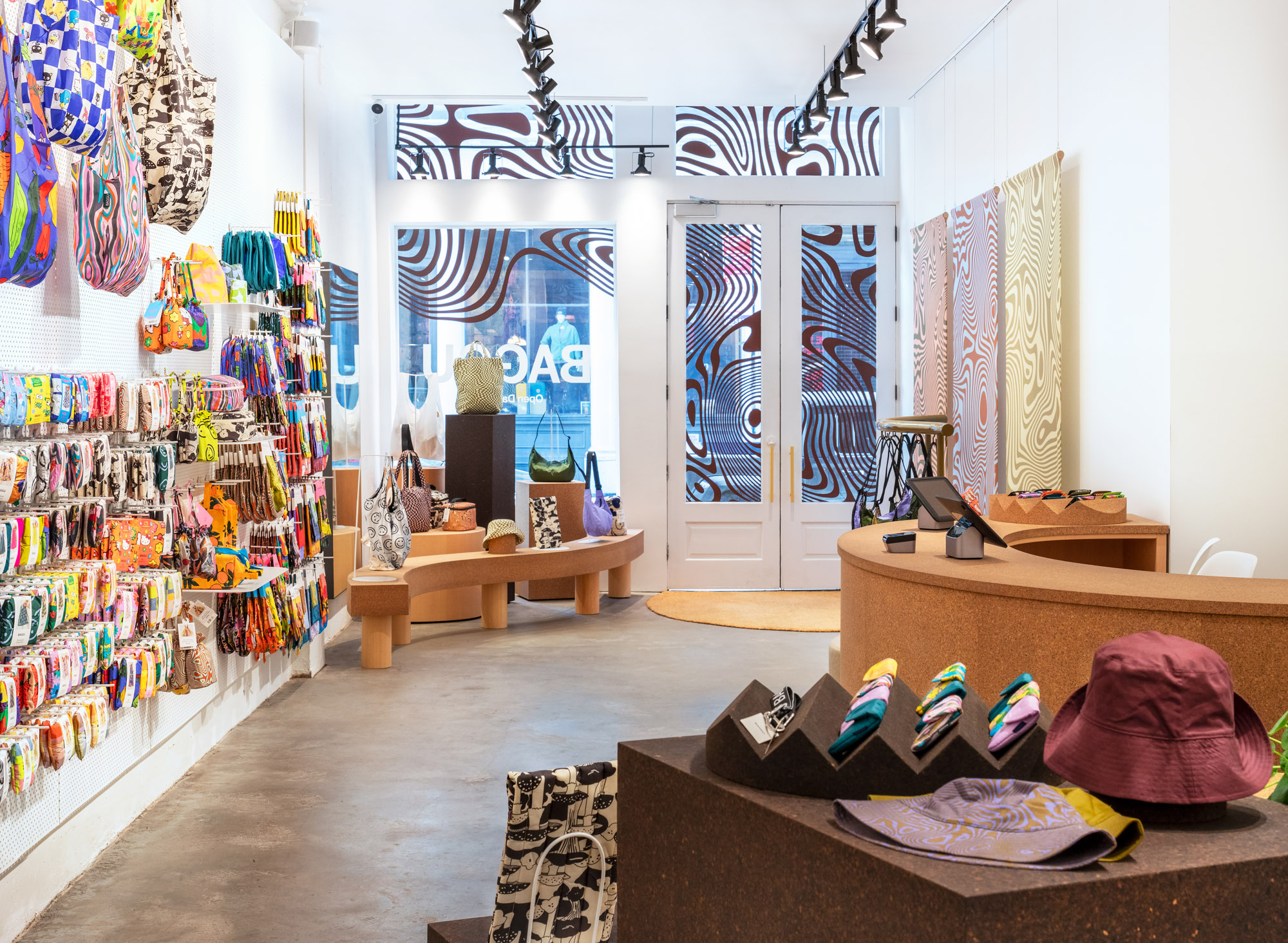A display of Suberra retail fixtures showcasing Baggu products in a store designed by Haddock Studio
