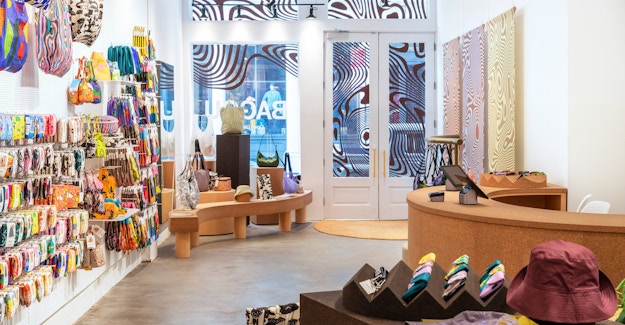 A display of Suberra retail fixtures showcasing Baggu products in a store designed by Haddock Studio
